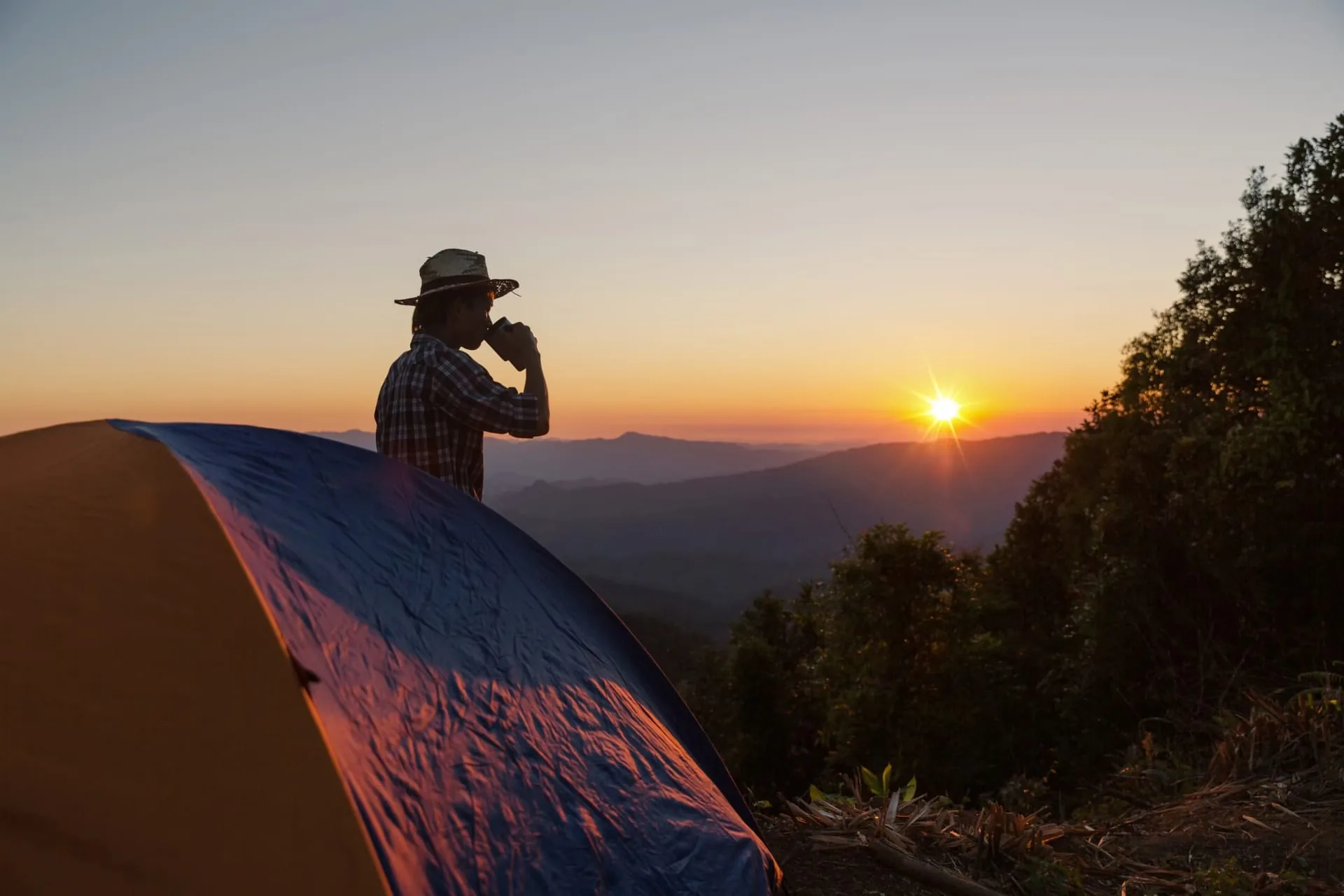 Compact daypack and trail accessories for a day hike